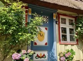 Haus am Hafen - Luxus unter Reet, Garten mit Terrasse