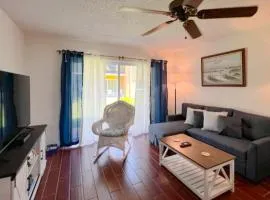 Condo across the street from the beach with pool, tennis, &. washer/dryer