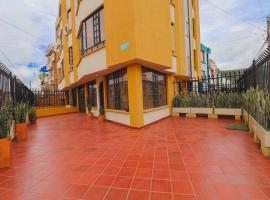 Apto duplex mandarina 2 niveles jardín y parqueo privado!, hotel en Sogamoso