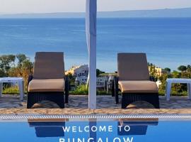 Bungalow White Tennis Apartments & Suites, ξενοδοχείο στο Πευκοχώρι