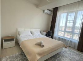 A cosy apartment، فندق في أوش