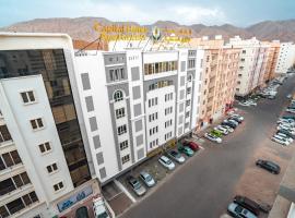 العاصمة للشقق الفندقية - Capital Hotel Apartments، فندق مع موقف سيارات في مسقط