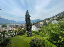 Muralto-Locarno: Collina Apt. 32, hotel in Muralto