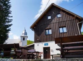 Planinarski dom ''Bijele stijene'' Mountain lodge, hotel que acepta mascotas en Tuk Vojni
