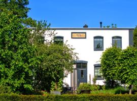 Sfeervolle bovenwoning uit 1916 met 2 slaapkamers, hotel familiar a Hooghalen