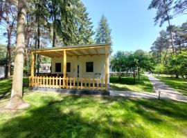 Ferienbungalows am Wolziger See، فندق عائلي في Heidesee