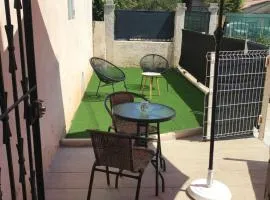 Studio cosy avec jardin proche centre et plage