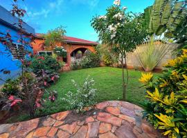 Maison Charlotte Forever Chambre d'hôtes chez un couple belgo togolais, location de vacances à Lomé