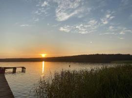 Domek Letniskowy nad Jeziorem, Las, Mazury, alquiler vacacional en la playa en Wiartel Mały