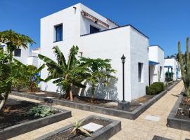 Charmant Appartement Casa Freesia Caleta avec piscine, golf hotel in Caleta De Fuste