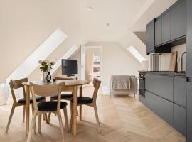 Dinbnb Apartments I Mid-City Luxury with Mini Balcony and Smart TV & Sound System, hotel u Bergenu