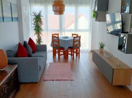Precioso apartamento con piscina en la playa, khách sạn ở Mogro