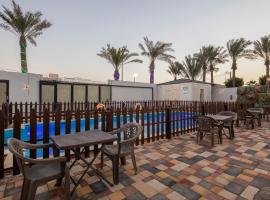 شاليهات البركة بارك, hotel sa Al Jubaylah