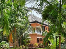 Joan's Homestay Near Kumarakom, Aleppey, Marari, počitniška hiška v mestu Vaikom