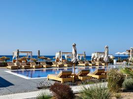 Sea Breeze Santorini Beach Resort, Curio By Hilton, resort in Perivolos