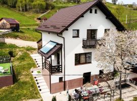 Pensiunea K9, hostal o pensión en Răchiţele