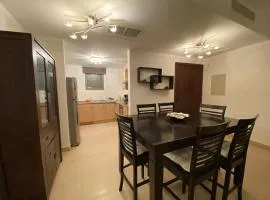 Lovely first floor tow bed rooms overviewing circular pool in Talabay Aqaba