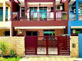 Ceria Homestay Putatan, villa in Putatan