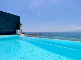 Faro Cullera. Villa pareada. Infinity pool .