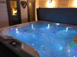 Jacuzzi - BBq - Jardin - Garden Lodge - Le Tulipier, hotel in Olne