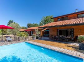 Villa familiale 10 pers. à Biscarrosse avec piscine chauffée, près du lac et des pistes cyclables - FR-1-319-488, hotel in Biscarrosse