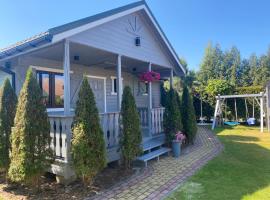 Domki Letniskowe Bursztynek, cabin in Dąbki