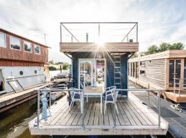 Tolles Tiny-Hausboot GÜNTER mit Dachterrasse, barco em Hamburgo