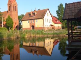 Kwatery pod wieżą, hotel with parking in Pogrodzie