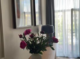 Lindens apartments with AC and view to central square