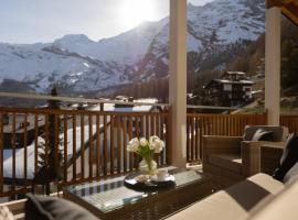 Victoria's Home - luxurious penthouse, hotel con estacionamiento en Saas-Fee