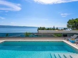 Luxury, seafront Villa IVAN with heated pool only 100m from beach