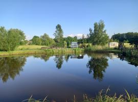 Domki i pokoje nad stawem koło Mrągowa: Mrągowo şehrinde bir çiftlik evi