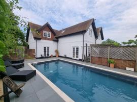 New Forest Cottage alongside Limewood Lyndhurst บ้านพักในลินด์เฮิร์สต์