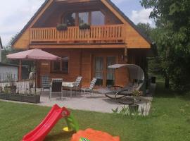Blockbohlenhaus-Steiner-Lodge, hotel with hot tubs in Steinen