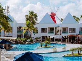 The Mill Resort and Suites: Palm-Eagle Beach şehrinde bir otel