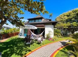 Bangalô Pé na Areia e Piscina Gigante no Beach Class Muro Alto、ポルト・デ・ガリーニャスのシャレー