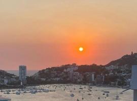 Casa con vista espectacular al mar con alberca, casa de temporada em Acapulco