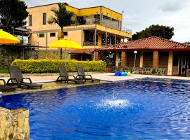 Hotel Campestre Los Mangos, hotel in Quimbaya