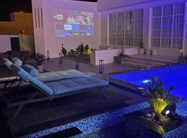 Kalnu kotedža JHR chalet pilsētā Salāla