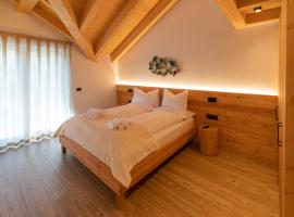 Brenta Rosso - Charme Apartments, hotel in zona Santel - Meriz, Fai della Paganella