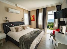 Carrington Suites, hotel sa 4 zvezdice u gradu Oludeniz