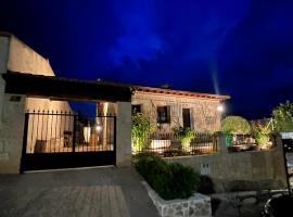 Apartamentos Rurales El Pedregoso、Alarillaのアパートホテル