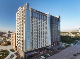 Kyriad Hotel Dongguan Houjie Convention and Exhibition Center Humen Station, hotelli kohteessa Dongguan alueella Houjie