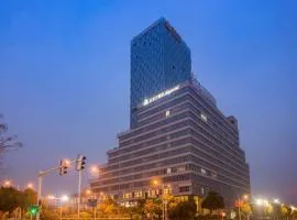 Magnotel Business Hotel Zhenjiang South Station Greenland Square