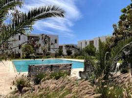 Luxurious Golf & Sea View Beach Apartment with Pool Access - Cocon de Taghazout Bay, holiday rental in Taghazout