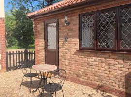 Ash Cottage, villa en Skegness