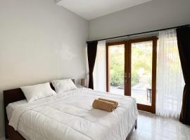 D'pandawa guest house, отель типа «постель и завтрак» в городе Унгасан