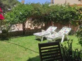 Apartamento a pie de playa con jardin privado