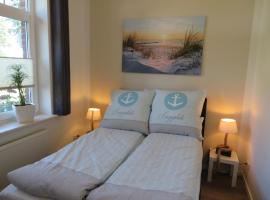 Happyness FeWo Smarthome, hotel with parking in Aurich