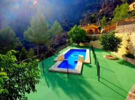 Casas Rurales Venta Ticiano, hotel con piscina a El Morrion